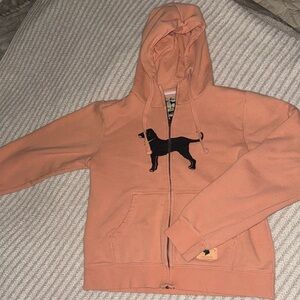 The Black Dog Peach Hoodie with Black Design